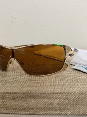 Oakley Women's Gold-Tone Frame Sunglasses with Brown Lenses Discontinued